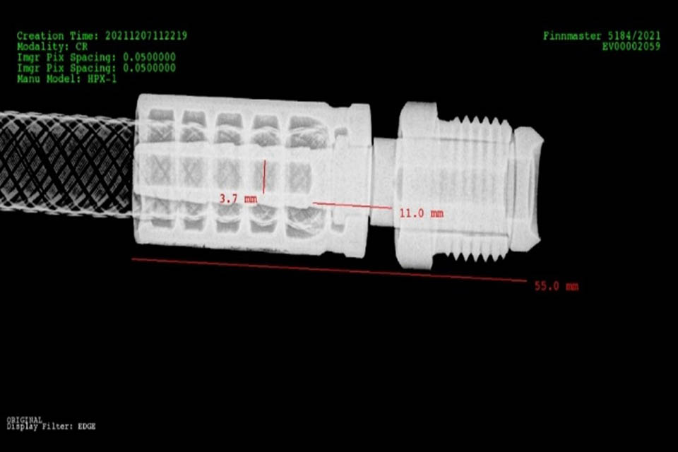 Radiographic image of CO2 pilot hose coupling showing blocked section of stem