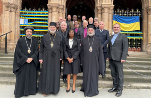 Photo of Faith Minister with church leaders