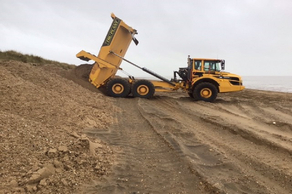 Beach shored up to strengthen Norfolk flood protection
