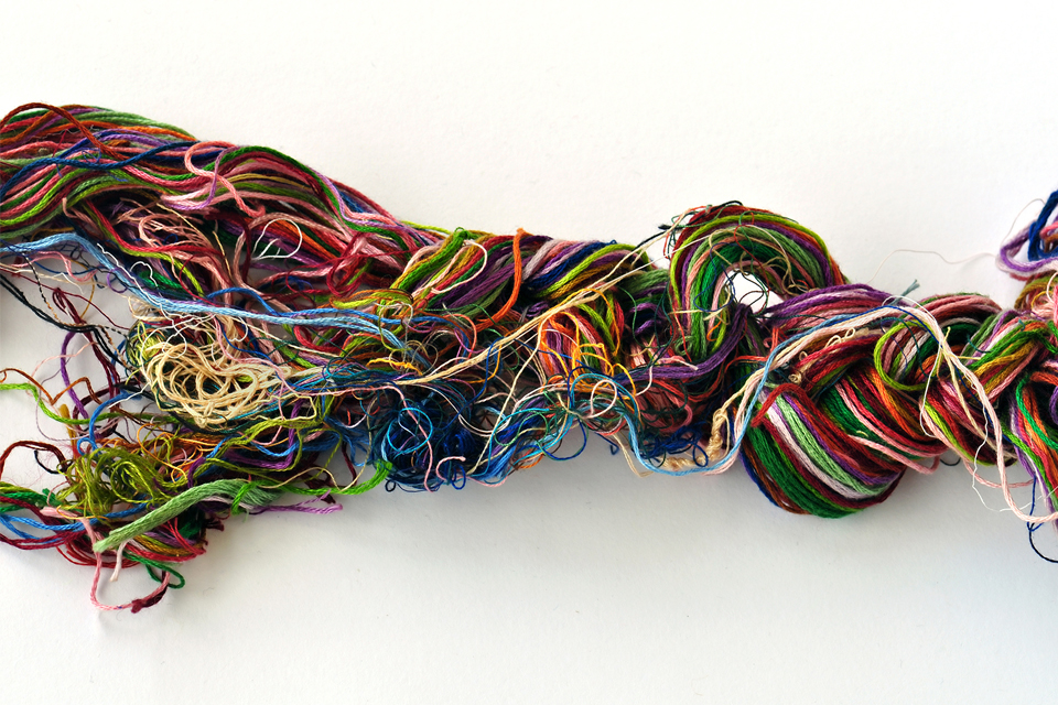 Tangled coloured threads
