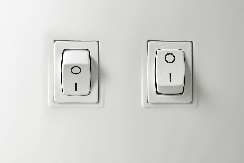 Two switches, one in the on position labelled 1, and one in the off position labelled 0