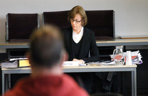 Inspector conducting a hearing