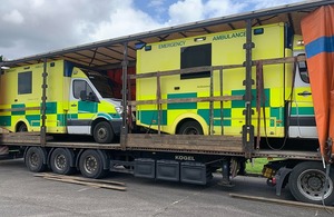 UK ambulances being loaded for transport to Ukraine