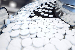 pills on a production line in a factory