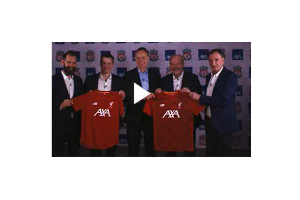 Board directors of Liverpool FC holding jersey sponsored by AXA