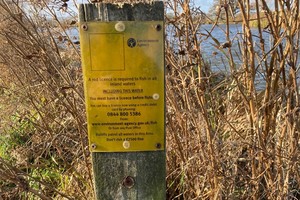 Sign displayed at the fishery stating an EA rod licence is required to fish