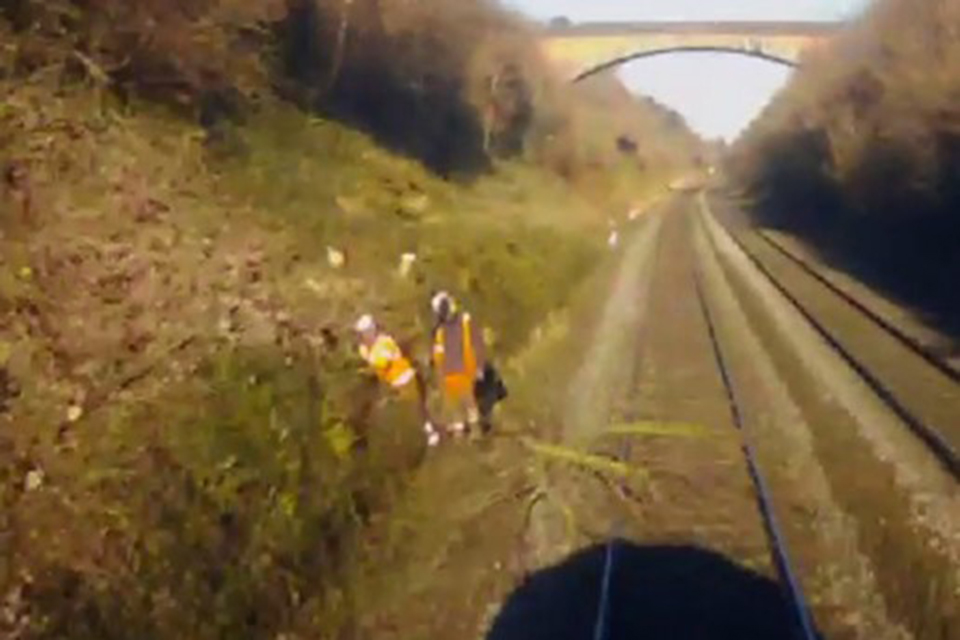 Still image taken from the train’s forward-facing CCTV showing the position of the track workers and the tree foul of the line shortly before the train struck the tree (image courtesy of CrossCountry).
