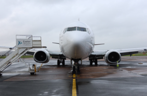 G-JMCY left-wing low due to the main landing gear beam damage