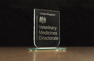 Glass stand with VMD logo