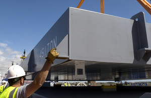 Hatch covers lowered in an NTS transporter