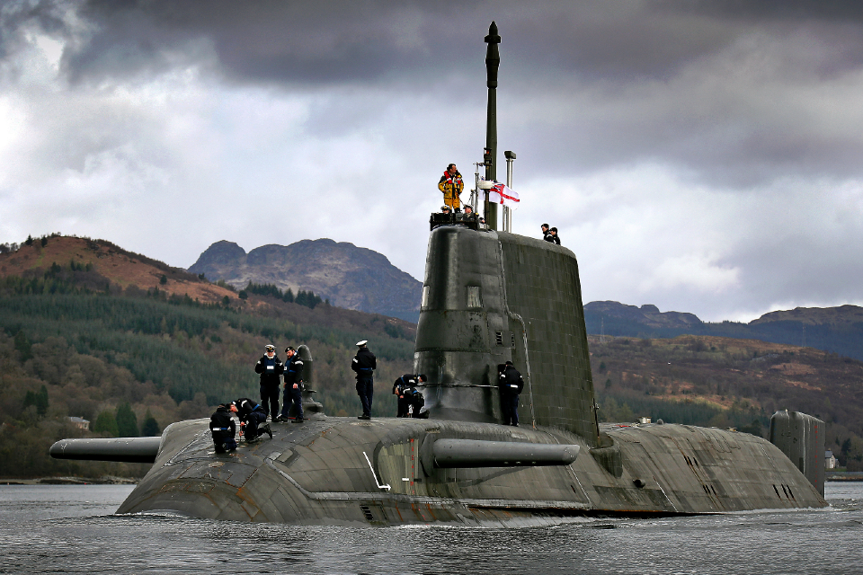 People standing on a submarine