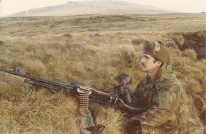 Military man with gun. Copyright: Manny Manfred.