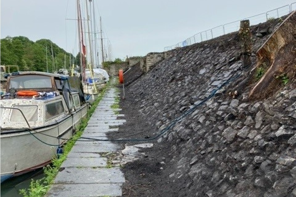 Historic wall at Lydney Harbour revealed as part of restoration work