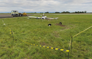 Figure 3: Accident site, looking south with the Runway 05 threshold behind.