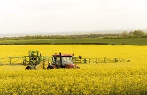 Oilseed rape spraying spring arable tractor and sprayerand sprayer