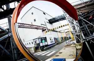 A reflection of the outside of the Magnox Reprocessing Plant in a mirror