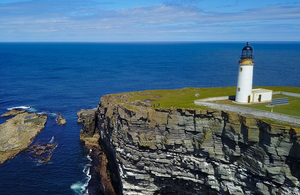Lighthouse on Westray, one of the Orkney Islands, above the steep cliffs of Noup Head.