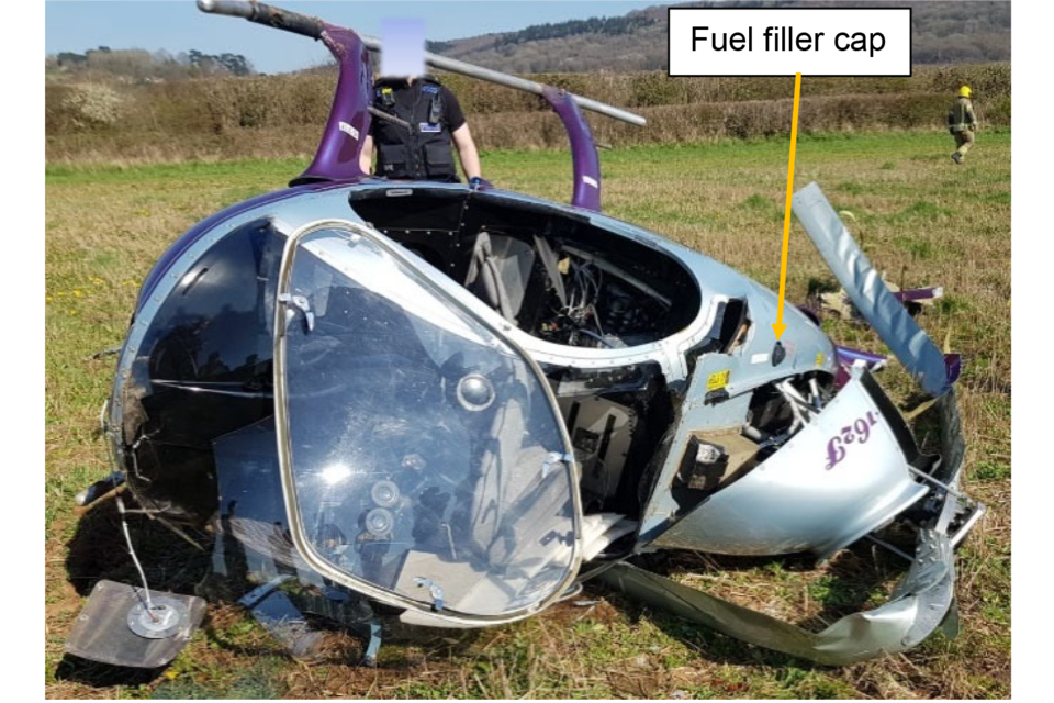 AAIB Report: Rotorway Executive 162F (G JDHN), Loud noise from the engine, autorotation, rollover on touchdown