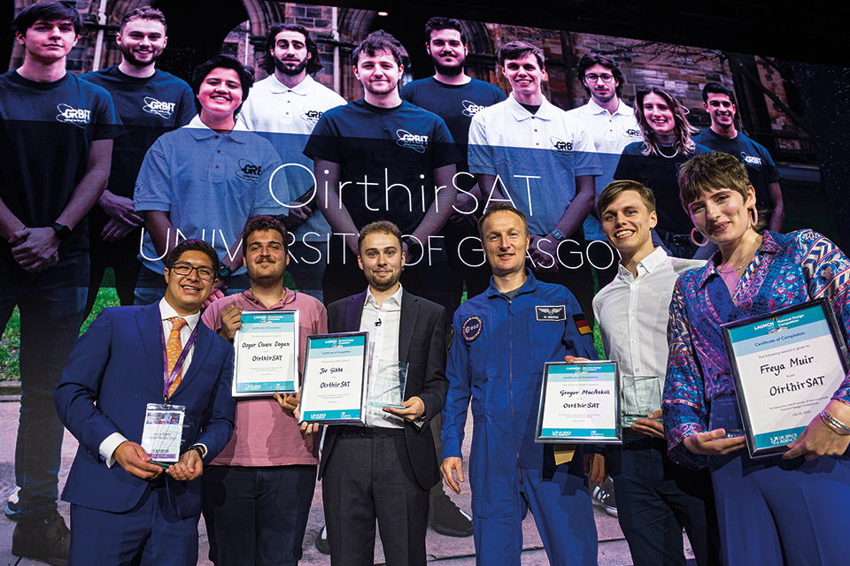 Members of the OirthirSAT team, from the University of Glasgow, with European Space Agency astronaut Matthias Maurer at the Farnborough International Airshow.