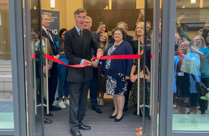 Jacob Rees-Mogg cuts the ribbon at the opening of the new government hub.