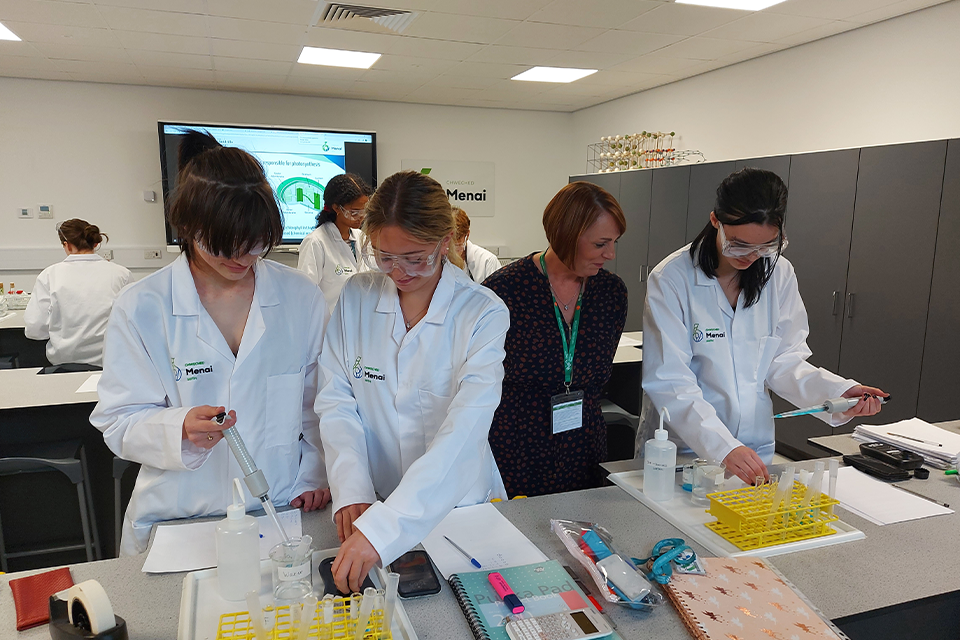Girls showing experiment