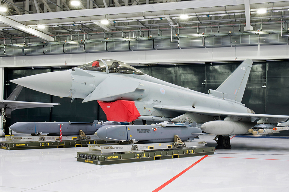 Storm shadow missiles next to a Typhoon fighter jet