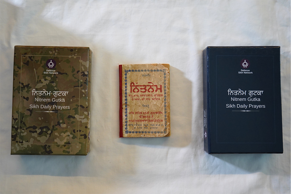 The modernised prayer books side by side with the original from WW1