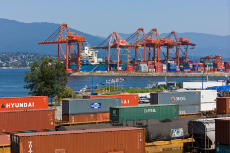 Shipping port with containers and cranes