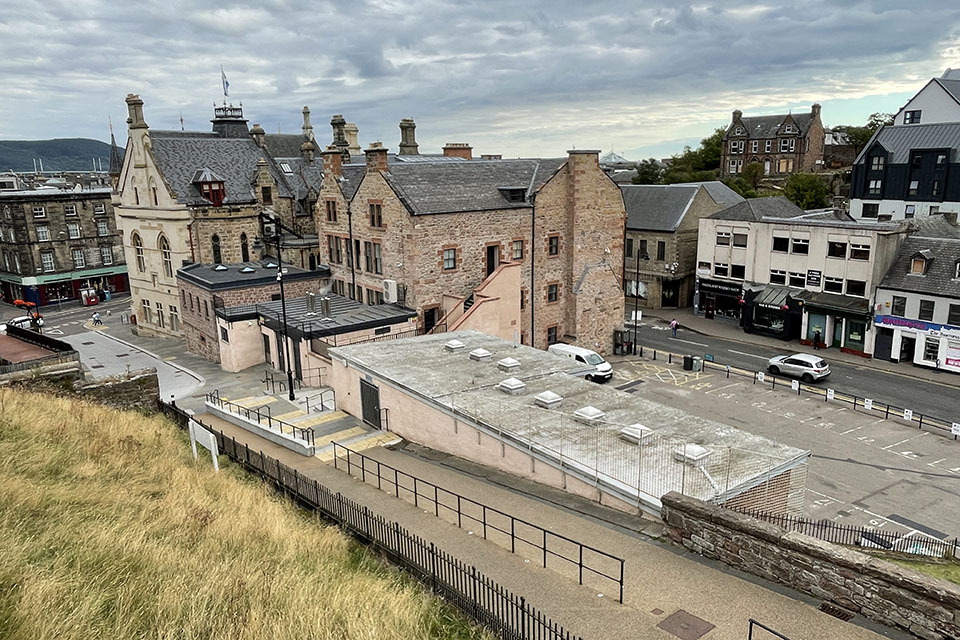 Looking down on a walled area at the castle site where the energy centre will be located