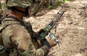 Solider using the multi-mode radio