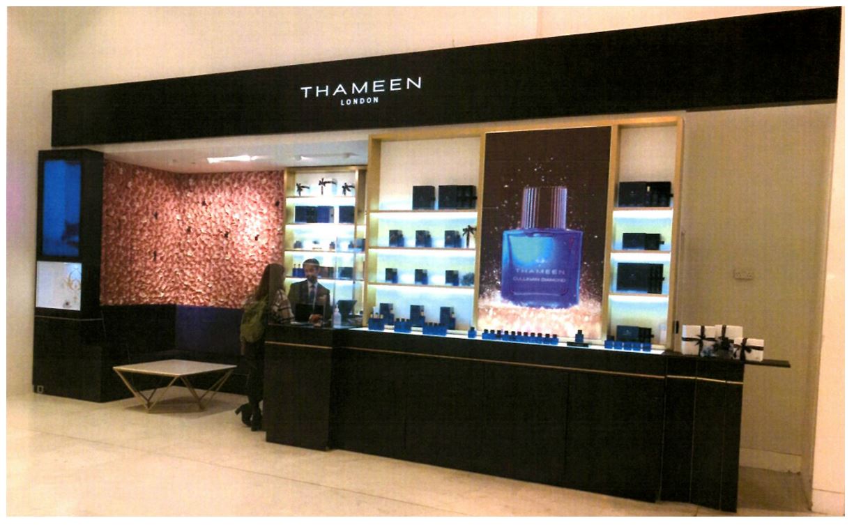 Fragrance store with bottles displayed and the store name above titled Thameen London