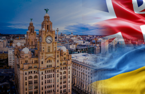 Royal Liver Building with UK and Ukrainian flags.