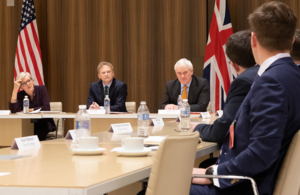 Photo of UK and US Secretaries around a table