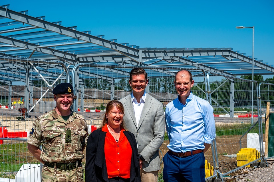 First steel frame erected for new facility to protect and preserve Army vehicles
