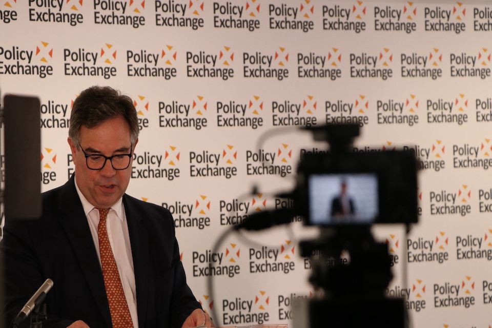 Minister Jeremy Quin delivering a speech on government reform.
