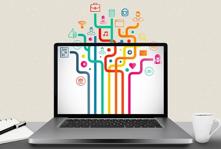 Decorative illustration of a laptop screen with colourful icons