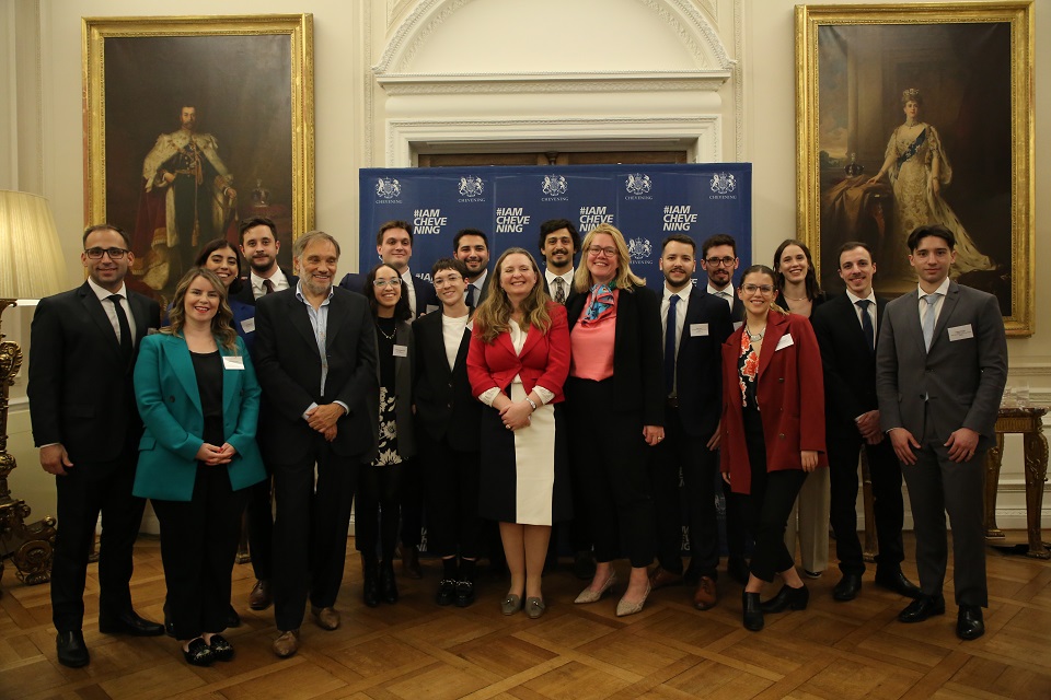 The group of 2023/2024 Chevening scholars with HMA Kirsty Hayes and DG Harriet Mathews