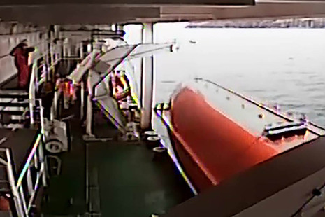 CCTV still showing the port lifeboat hanging on its side from the falls over the ship’s side.