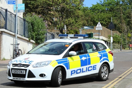Police car on patrol in Brighton.