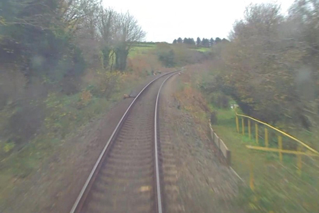 Forward-facing CCTV image from a different train showing the site access point where the near miss took place (image courtesy of Network Rail).
