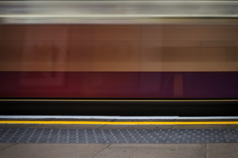 Generic image of a train passing a station platform
