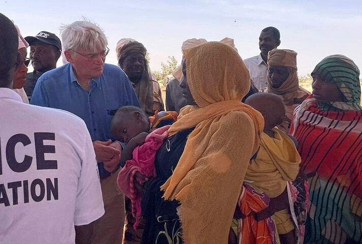 Minister for Development and Africa Andrew Mitchell during his visit to Chad, meeting refugees fleeing from violence and hunger in Sudan.