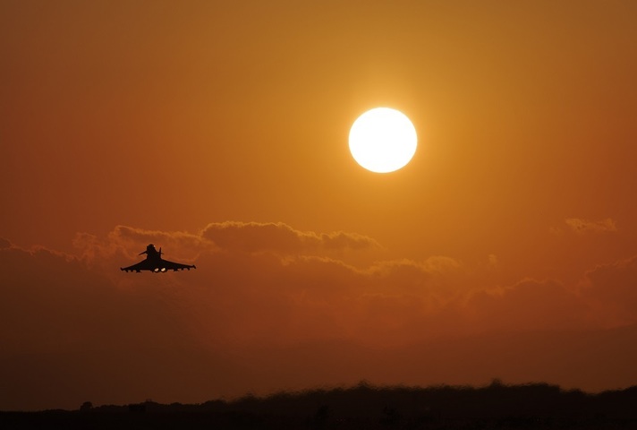 An RAF Typhoon fighter jet departs to conduct its mission