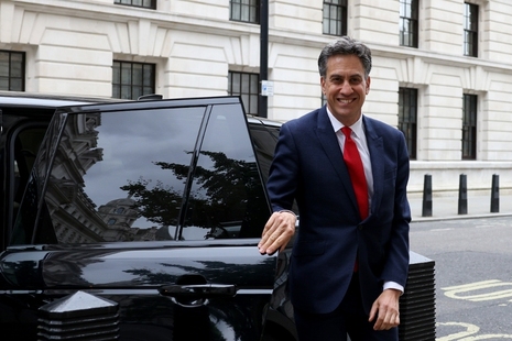 Ed Miliband getting out of the minietrial car.
