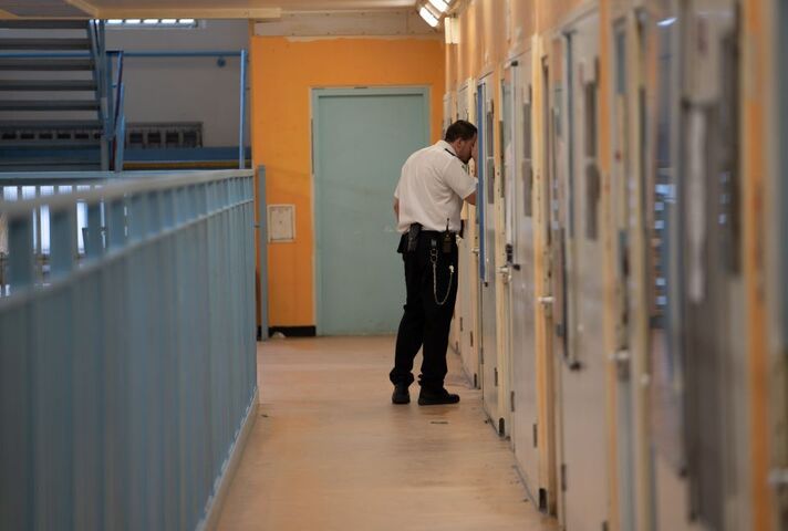 Prison officer checking the cell