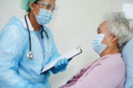 Doctors and patient