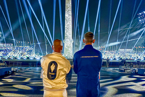 John McFall (right) alongside french sailor and Paralympic champion Damien Seguin (left) at the opening ceremony of the 2024 Paralympic games in Paris. Image: ESA