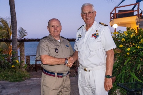 Rev (Sqn Ldr) Neil Galloway with the President of the Apostolat Militaire International, VAdm Matthieu Borsbloom (Royal Netherlands Navy) shakinghands