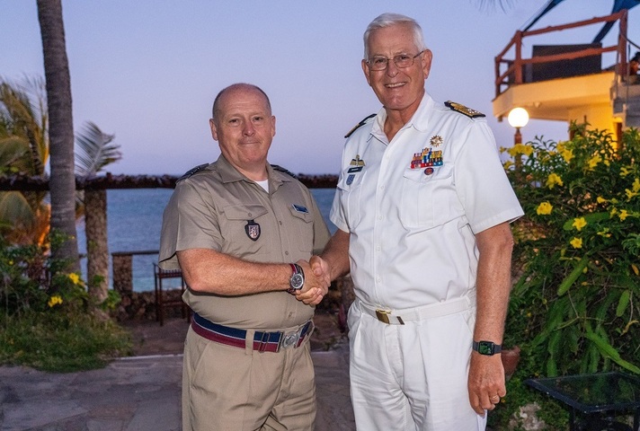 Rev (Sqn Ldr) Neil Galloway with the President of the Apostolat Militaire International, VAdm Matthieu Borsbloom (Royal Netherlands Navy) shakinghands