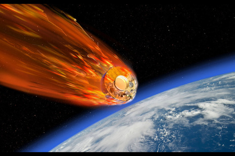 An artist's impression of a Cluster spacecraft breaking apart during reentry. Credit: ESA/David Ducross